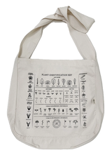 Tote bag with a plant identification key design